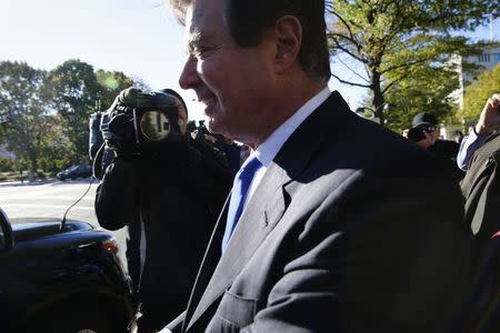 U.S. President Donald Trump's former campaign manager Paul Manafort departs U.S. District Court after a hearing in the first charges stemming from a special counsel investigation of possible Russian meddling in the 2016 presidential election in Washington, U.S., October 30, 2017. REUTERS/Jim Bourg