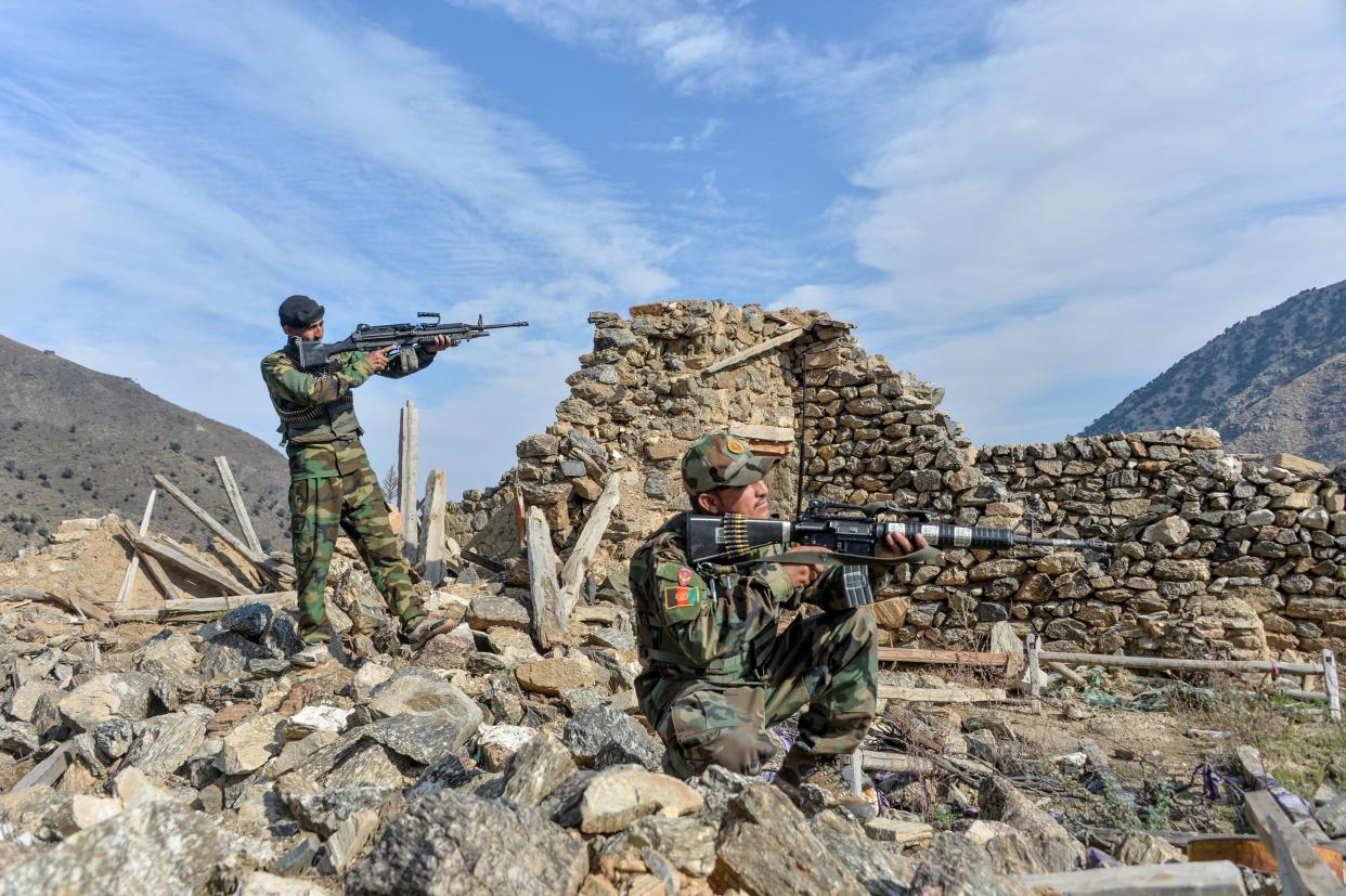 In this photograph taken on November 25, 2019, Afghan security forces take part in an ongoing operation against Islamic State (IS) militants in the Achin district of Nangarhar province. (Noorullah Shirzada/AFP via Getty Images)