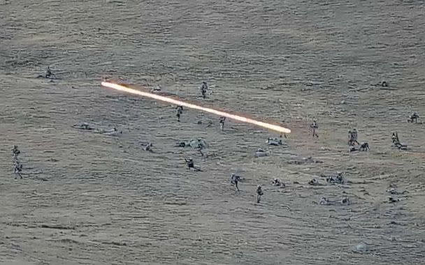 PHOTO: In this image taken from a YouTube footage released by Armenian Defense Ministry on shows Azerbaijanian servicemen crossing the Armenian-Azerbaijani border and approaching the Armenian positions, Sept. 13, 2022. (Armenian Defense Ministry via AP)