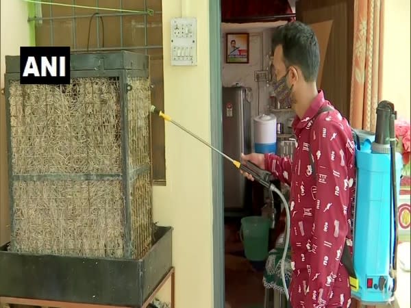 A volunteer spraying the disinfectant spray. (Photos/ANI)