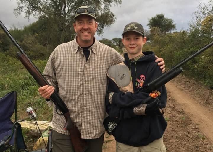 In this 2017 photo obtained by the Associated Press, James Story and his son pose for a portrait as they dove hunt in an unknown location in Argentina. In the normally genteel world of high diplomacy, the top U.S. envoy to Venezuela cuts an unusual figure. Born in a small South Carolina town, James Story is an avid hunter and proud collector of memorabilia featuring iconic revolutionaries like Vladimir Lenin and Ernesto “Che” Guevara. (AP)