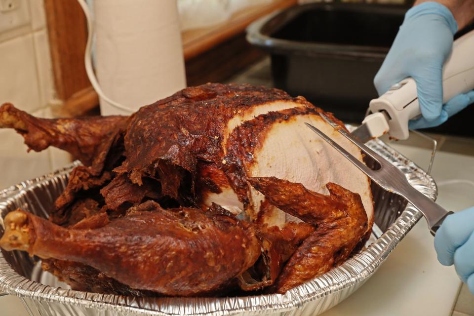 The deep-fried turkeys are golden and crispy on the outside, moist on the inside.