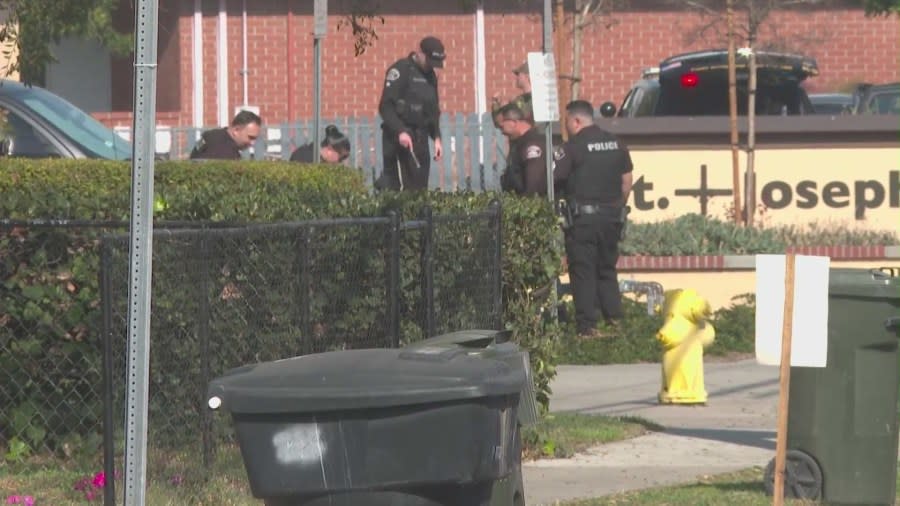Possibly armed man taken into custody at church near school in Orange County 