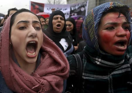 Members of civil society organisations chant slogans during a protest to condemn the killing of 27-year-old woman, Farkhunda, who was beaten with sticks and set on fire by a crowd of men in central Kabul in broad daylight on Thursday, in Kabul, in this file picture taken March 24, 2015. REUTERS/Omar Sobhani/Files