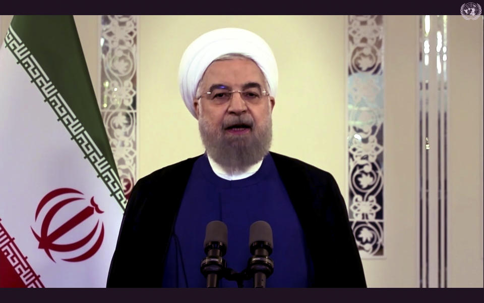 In this image made from UNTV video, Iranian President Hassan Rouhani speaks in a pre-recorded message which was played during the 75th session of the United Nations General Assembly, Tuesday, Sept. 22, 2020, at UN headquarters in New York. The U.N.'s first virtual meeting of world leaders started Tuesday with pre-recorded speeches from some of the planet's biggest powers, kept at home by the coronavirus pandemic that will likely be a dominant theme at their video gathering this year. (UNTV via AP)