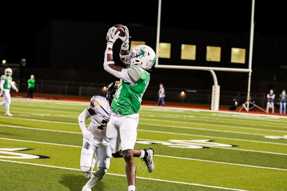 Lake Dallas High School wide receiver Keonde Henry catches a pass. Henry signed with Memphis football in December.