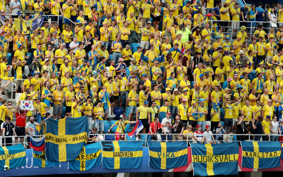 <p>Sea of yellow: Sweden fans decked out in their nation’s famous yellow were a sight to behold in Nizhny Novgorod. (Reuters) </p>