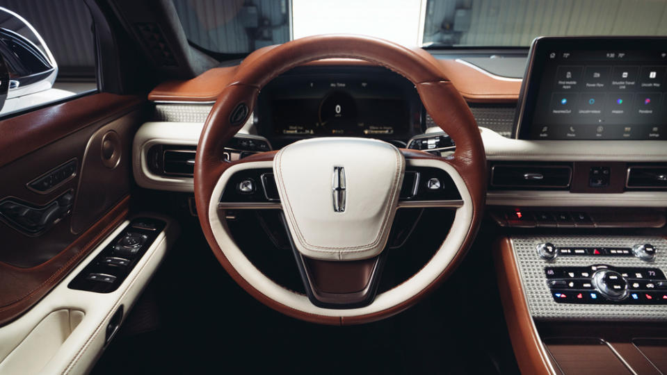 A multi-faceted mesh metal trim runs across the instrument panel and around many of the controls. - Credit: Photo: Courtesy of the Lincoln Motor Company.