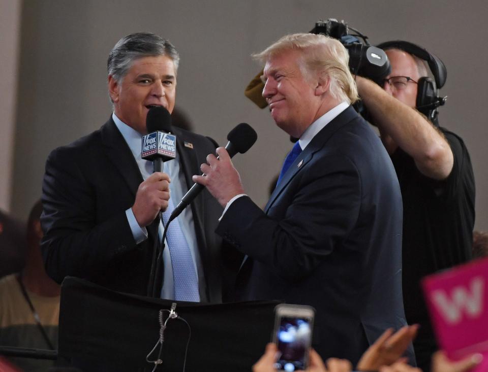 <p>Mr Hannity and Mr Trump have been friends for years, and now own houses within a six-minute drive of each other</p> (Getty Images)