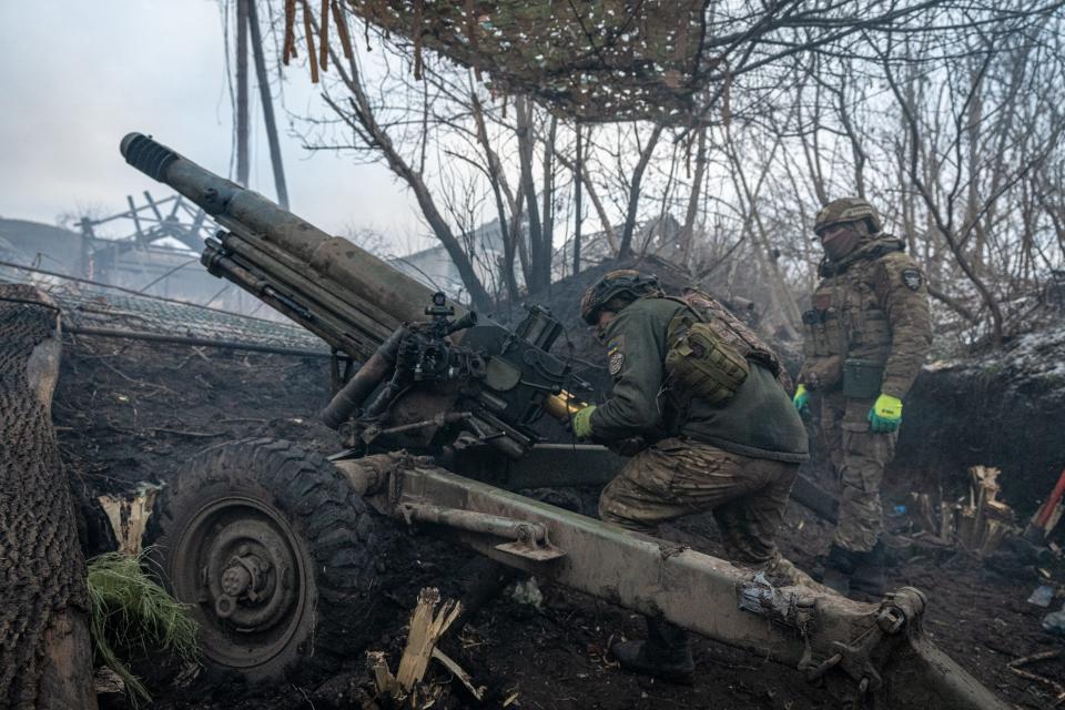 Ukrainian soldiers reload an artillery unit on the front line, in the direction of the Kreminna as the Russian - Ukraine war continues in Donetsk Oblast, Ukraine on January 30, 2024.