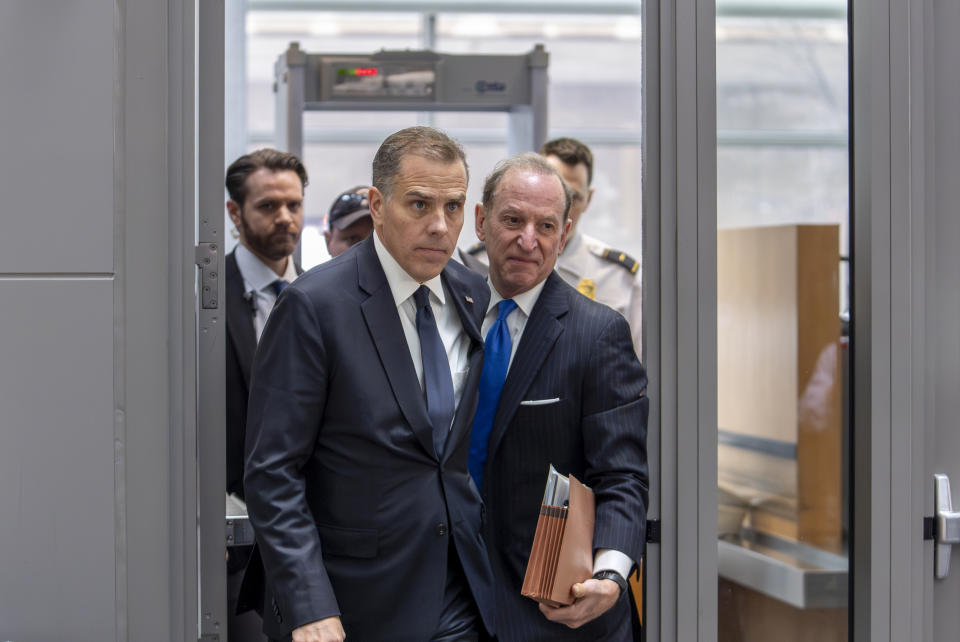 Hunter Biden, left, son of President Joe Biden, arrives with attorney Abbe Lowell at the O'Neill House Office Building for a closed-door deposition in a Republican-led investigation into the Biden family, on Capitol Hill in Washington, Wednesday, Feb. 28, 2024. Lawmakers from the House Oversight and Accountability Committee and the House Judiciary Committee are conducting the inquiry. (AP Photo/J. Scott Applewhite)