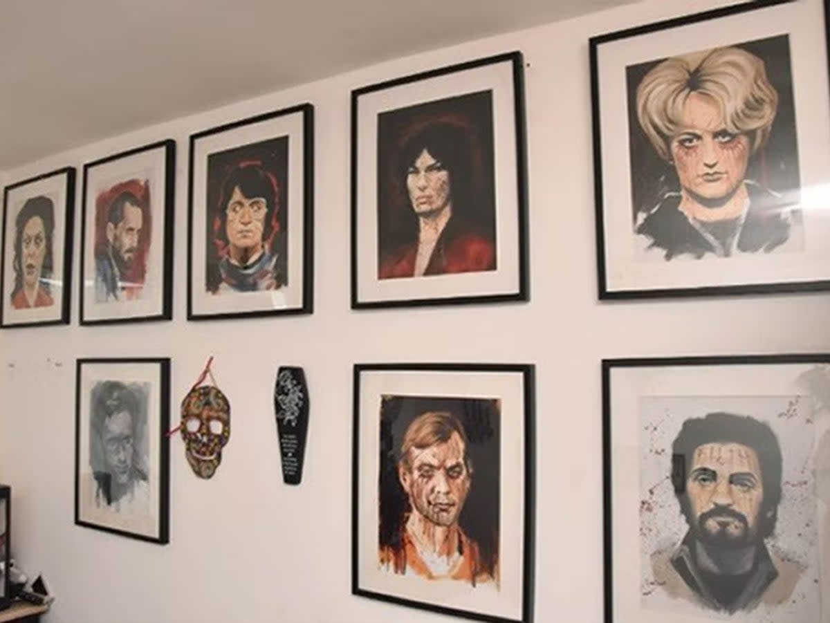 Pictures of serial killers and criminals on Groves’ bedroom wall ((Hampshire Constabulary/PA) (PA Media))