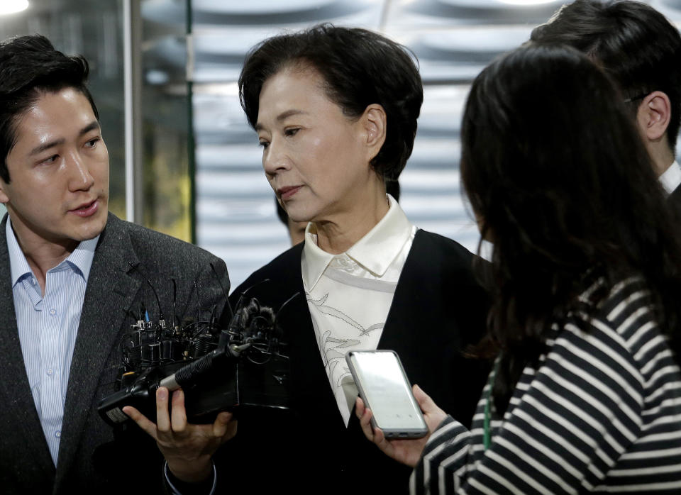 Lee Myung-hee, wife of the late Korean Air President Cho Yang-ho, center, arrives at the Seoul Central District Court in Seoul, South Korea, Thursday, May 2, 2019. Lee and Cho's daughter on Thursday attended the opening trial on their charges including illegal hiring of a Filipino maid. (AP Photo/Ahn Young-joon)