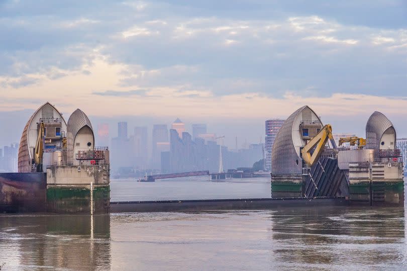 The Thames Barrier with the London skyline in the background