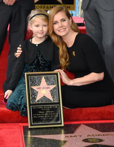 <p>Stewart Cook/Variety/Penske Media/Getty</p> Amy Adams at her Walk of Fame ceremony with her daughter Aviana in 2017