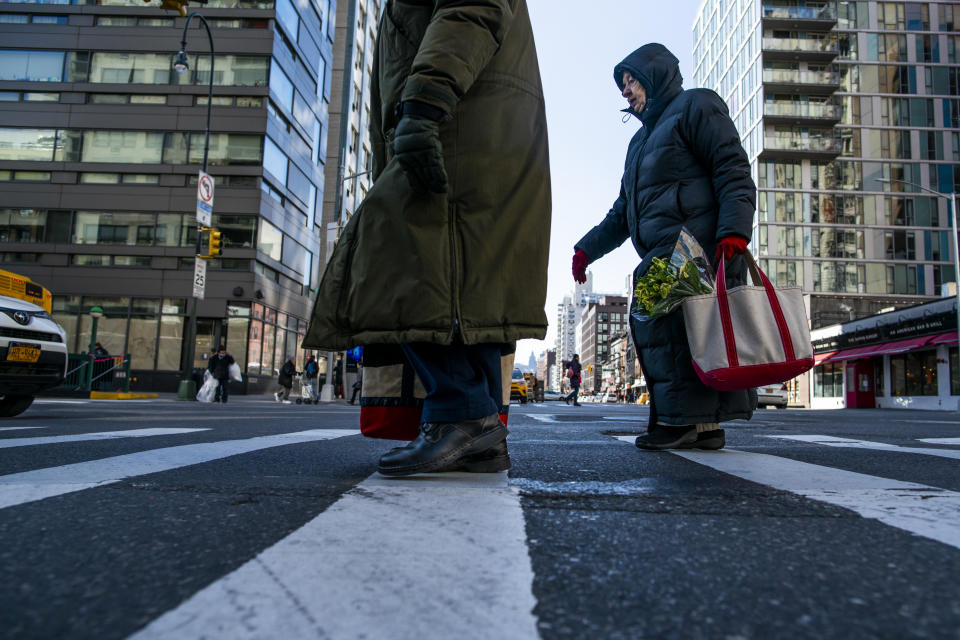 NEW YORK, NY - MARCH 01: Customers carry their own reusable bags after shopping at a local supermarket on March 1, 2020 in New York City.  New York State is banning the distribution of single-use plastic bags, trying to reduce billions of discarded bags that ends into landfills, rivers and oceans. (Photo by Eduardo Munoz Alvarez/Getty Images)