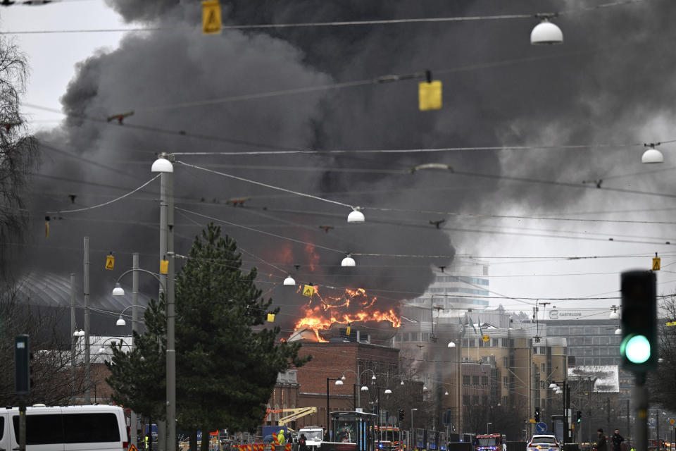 FILE - Smoke rises after a fire broke out at the Liseberg amusement park's new water world Oceana in Goteborg, Sweden, Monday Feb. 12, 2024. A welding operation caused a huge fire in February at a water park that was under construction at one of Sweden’s biggest amusement centers, causing the death of one person. Police said Wednesday, May 15, 2024, that when carrying out some welding on the water slide “a fire started which then spread to the rest of the building,” causing "great destruction.” (Björn Larsson Rosvall/TT News Agency via AP, File)