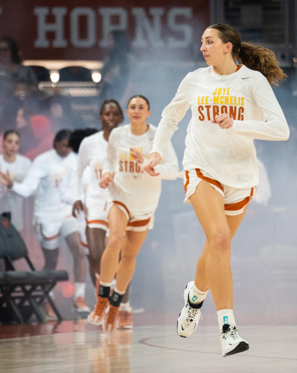 Texas forward Taylor Jones leads the team out for pregame warmups ahead of the Nov. 29 win over Oral Roberts at Moody Center. She went on to make all 11 of her shots without a miss in the game, only the second time a Longhorns player has accomplished that feat.