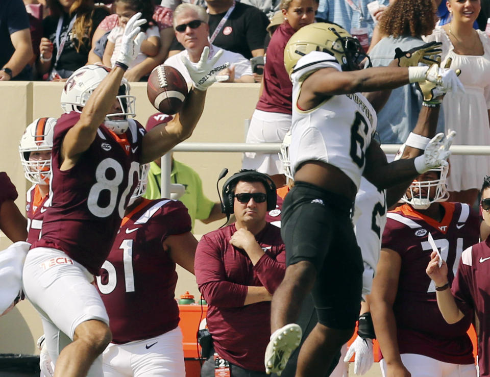 Wofford defensive back Okachi Emmanwori (6) breaks up a pass intended for Virginia Tech's Kaleb Smith (80) during the first half of an NCAA college football game, Saturday, Sept. 17, 2022, in Blacksburg Va. (Matt Gentry/The Roanoke Times via AP)