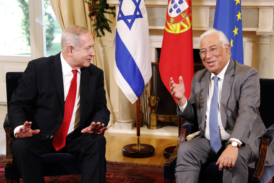 Israeli Prime Minister Benjamin Netanyahu, left, and Portuguese Prime Minister Antonio Costa meet at the Sao Bento palace in Lisbon Thursday, Dec. 5, 2019. (AP Photo/Armando Franca)