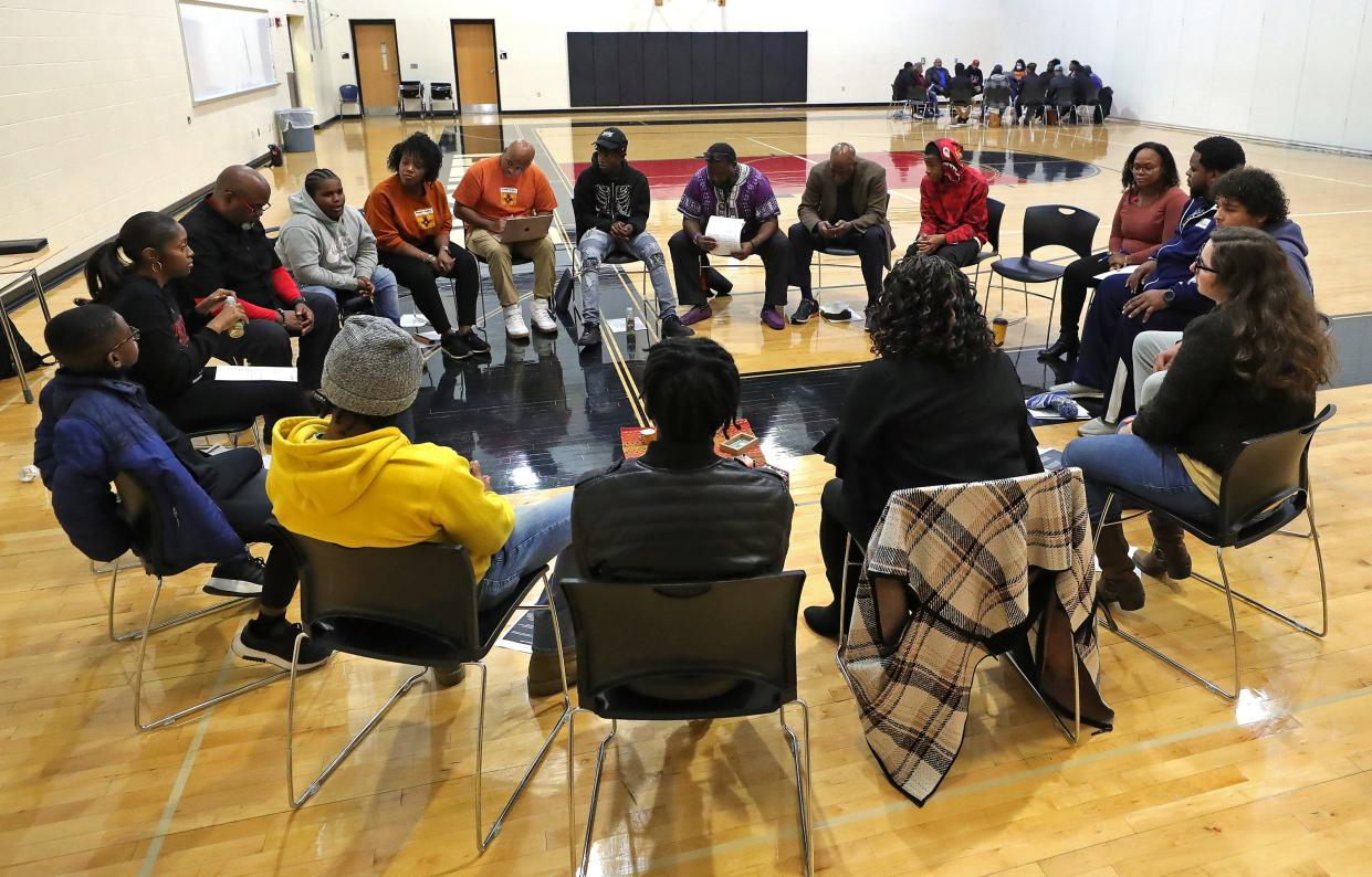 Dozens of concerned citizens, young and old, gathered in Peace Circles with Project Ujima, a grassroots community engagement organization based in West Akron, to discuss gun violence in the community at Buchtel CLC in November.