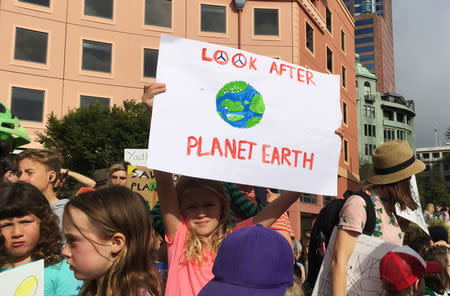 Protesters demanding action on climate change gather at Te Ngakau Civic Square in Wellington, New Zealand March 15, 2019. REUTERS/Charlotte Greenfield