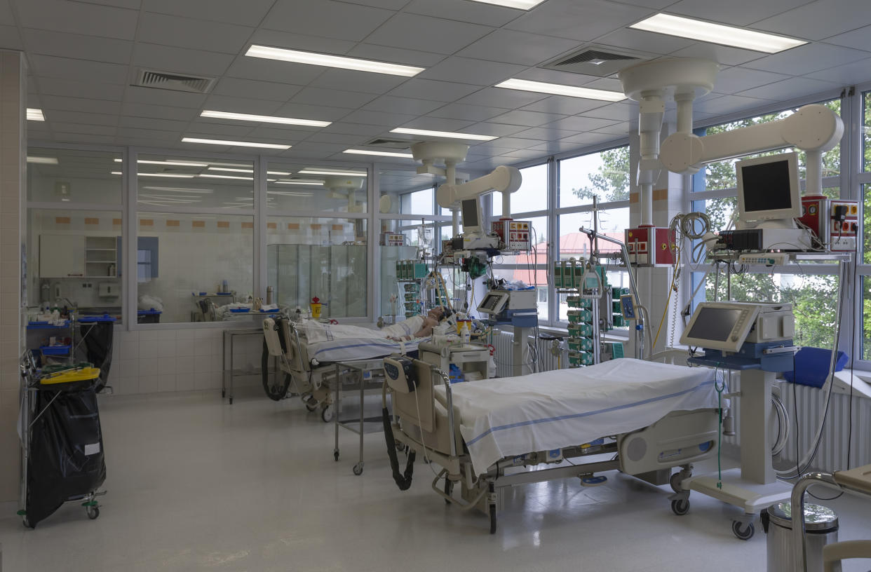 Intensive care unit in hospital, beds with monitors, ventilators, a place where can be  treated patients with pneumonia caused by coronavirus covid 19.