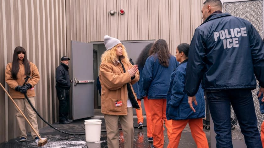 Nicky Nichols, played by Natasha Lyonne, pleads with an Immigration and Customs Enforcement (ICE) officer in the Netflix series "Orange is the New Black."