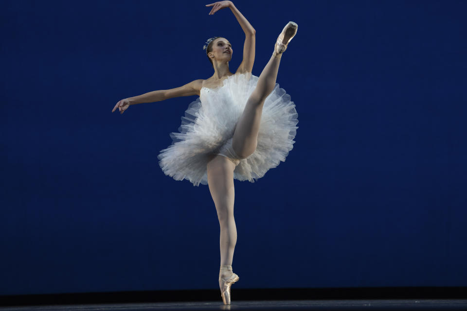 American Ballet Theater's ballerina Devon Teuscher rehearses for a performance at the Shanghai Grand Theater in Shanghai, Thursday, Nov. 2, 2023. The American national ballet company is returning to China for the first time in a decade for shows in Shanghai and Beijing in the latest sign strained relations between the United States and China are beginning to thaw. (AP Photo/Ng Han Guan)