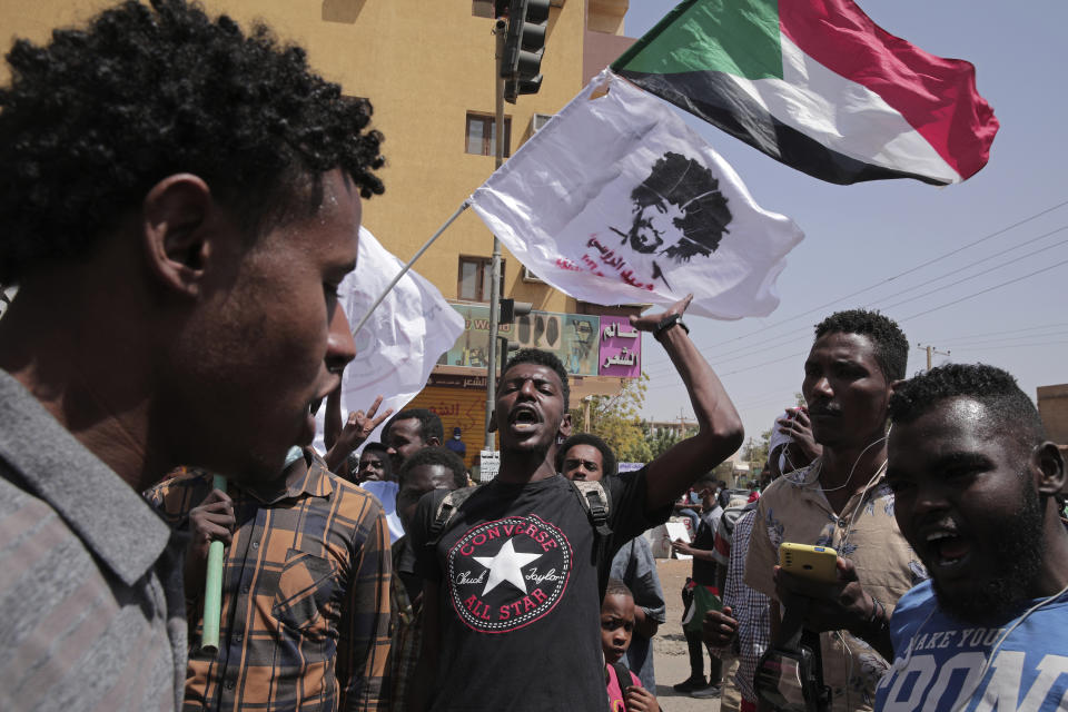 Sudanese protesters rally against the October 2021 military coup which has led to deaths and scores of arrests of demonstrators, in Khartoum, Sudan, Monday, Feb. 28, 2022. Since the coup, more than 80 people, mostly young men, have been killed and over 2,600 others injured in the protests, according to a Sudanese medical group. (AP Photo/Marwan Ali)