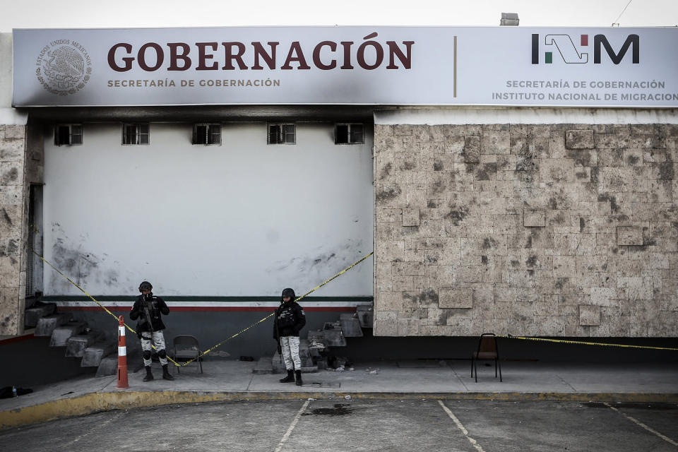 Image: Police stand guard outside a Mexican immigration detention center in Ciudad Juarez, Mexico, on March 28, 2023. (Christian Chavez / AP file)