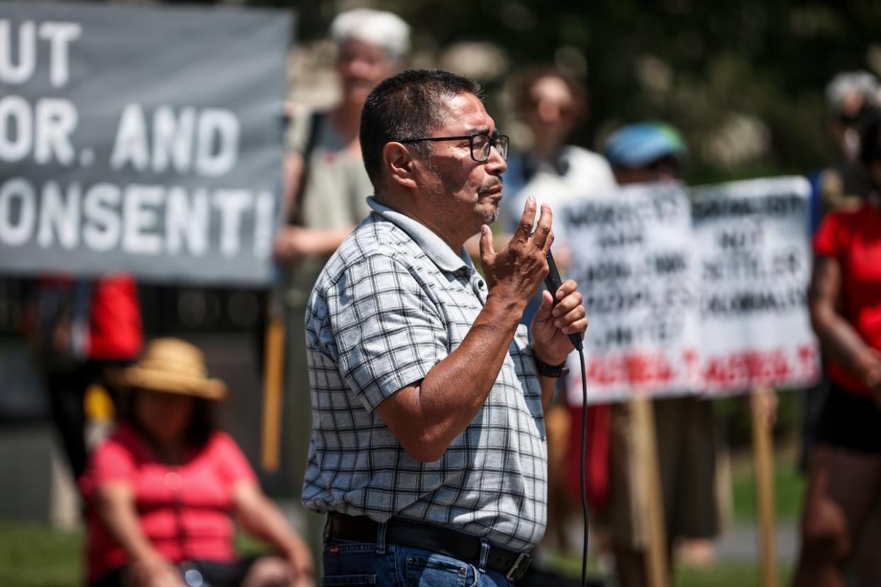 Rudy Turtle, chief of Grassy Narrows First Nation, addresses a rally against mining proposals on First Nations territory in Toronto in July 2023.  (Evan Mitsui/CBC - image credit)