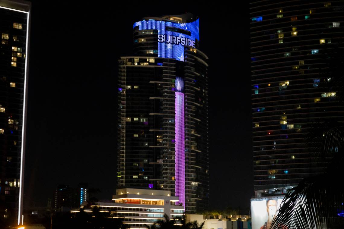 The Paramount Miami Worldcenter uses its 60-story LED display to honor the victims of the Surfside condo collapse and the first responders who led the search and rescue effort. (Eva Marie Uzcategui/AP Images for Paramount Miami Worldcenter)