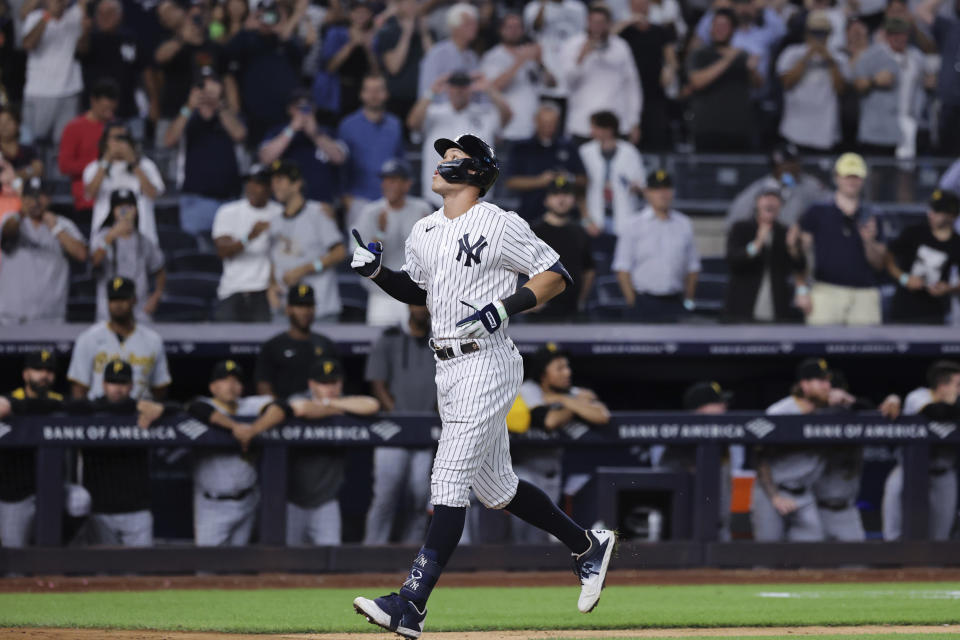New York Yankees' Aaron Judge heads for home after hitting his 60th home run of the season, during the ninth inning of the team's baseball game against the Pittsburgh Pirates on Tuesday, Sept. 20, 2022, in New York. (AP Photo/Jessie Alcheh)