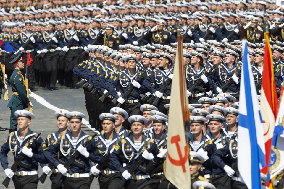 Russian sailors march in Red Square during the Victory Day military parade marking the 75th anniversary of the Nazi defeat in WWII in Moscow, Russia, Wednesday, June 24, 2020. The Victory Day parade normally is held on May 9, the nation's most important secular holiday, but this year it was postponed due to the coronavirus pandemic. (AP Photo/Alexander Zemlianichenko)