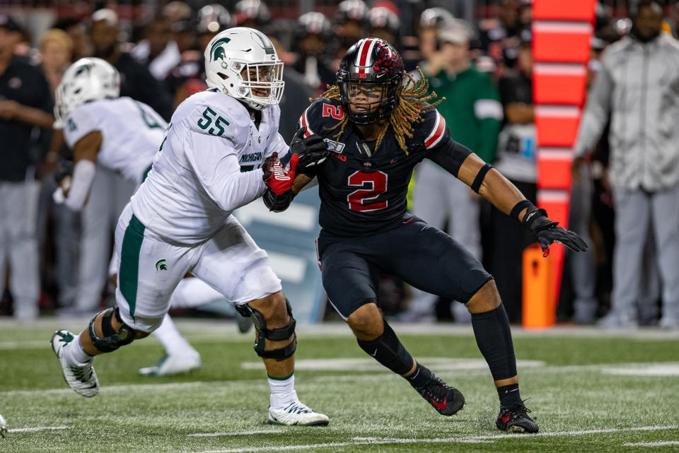 Chase Young #2 of the Ohio State Buckeyes rushes against the Michigan State Spartans on Saturday. (Getty)