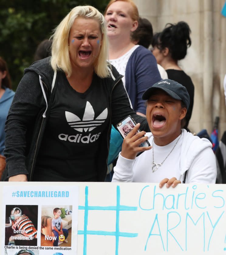 Charlie Gard supporters react outside the High Court after his parents ended their legal battle (Picture: PA)