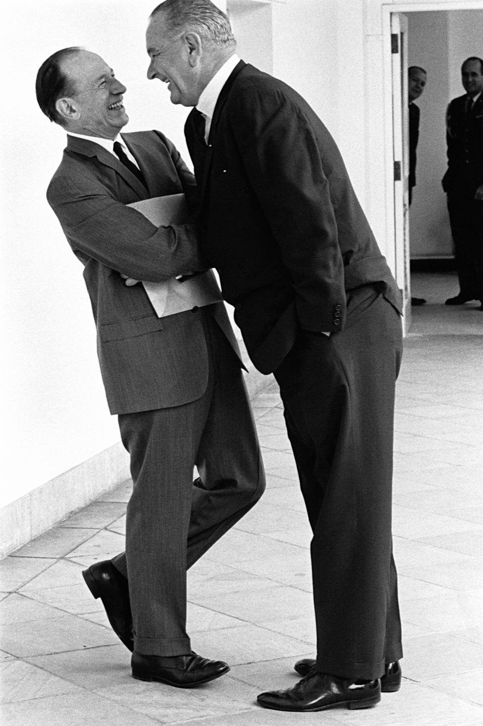 President Lyndon B. Johnson leans over a political colleague in mock intimidation to parody how he gets his way in Washington. (Photo: Photo by  CORBIS/Corbis via Getty Images)