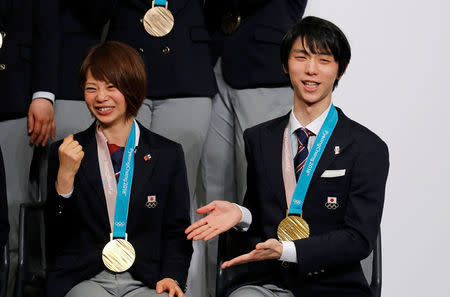 Pyeongchang 2018 Winter Olympics Men's figure skating gold medallist Yuzuru Hanyu (R) and Women's speed skating gold medallist Nana Takagi attend a news conference with other medalists upon their return from the Pyeongchang Winter Games, in Tokyo, Japan, February 26, 2018. REUTERS/Toru Hanai