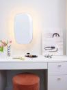 <p>The velvet stool and light-up mirror make makeup application easier and more style in this Studio DB-designed space. A vanity is a perfect addition to the main bathroom. So if space allows, take note. </p>