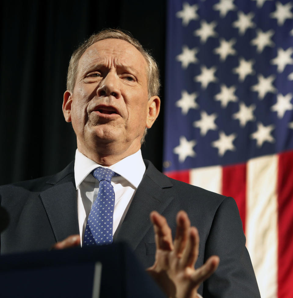 Former New York Gov. George Pataki announces his plans to seek the Republican nomination for president, Thursday, May 28, 2015, at the historic town hall in Exeter, N.H.  (AP Photo/Jim Cole)