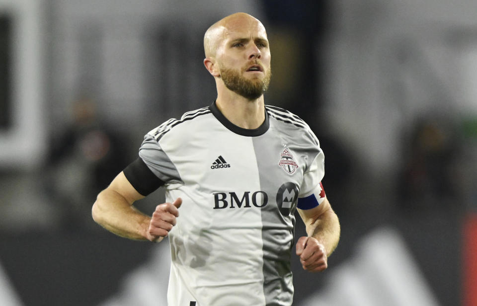FILE - Toronto FC midfielder Michael Bradley in action during the first half of an MLS soccer match against D.C. United, Saturday, Feb. 25, 2023, in Washington. Toronto FC announced Tuesday, Oct. 17. 2023, that Bradley, a former U.S. captain, will retire from soccer at age 36 after Toronto's season finale this weekend. (AP Photo/Terrance Williams, File)