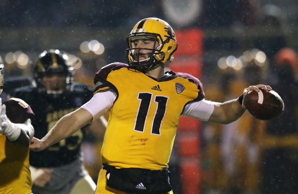 Central Michigan quarterback Shane Morris throws during the first half of an NCAA college football game against Western Michigan, Wednesday, Nov. 1, 2017, in Kalamazoo, Mich. (AP Photo/Carlos Osorio)