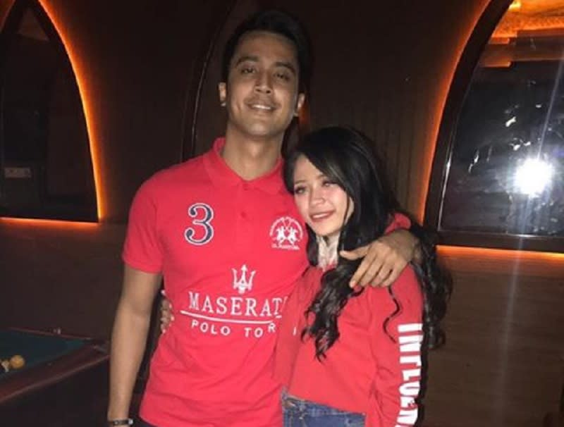 Facebook user ‘Mei Fina’ with Aliff in one of the viral photos that she says was taken from a lost phone. — Picture via Twitter