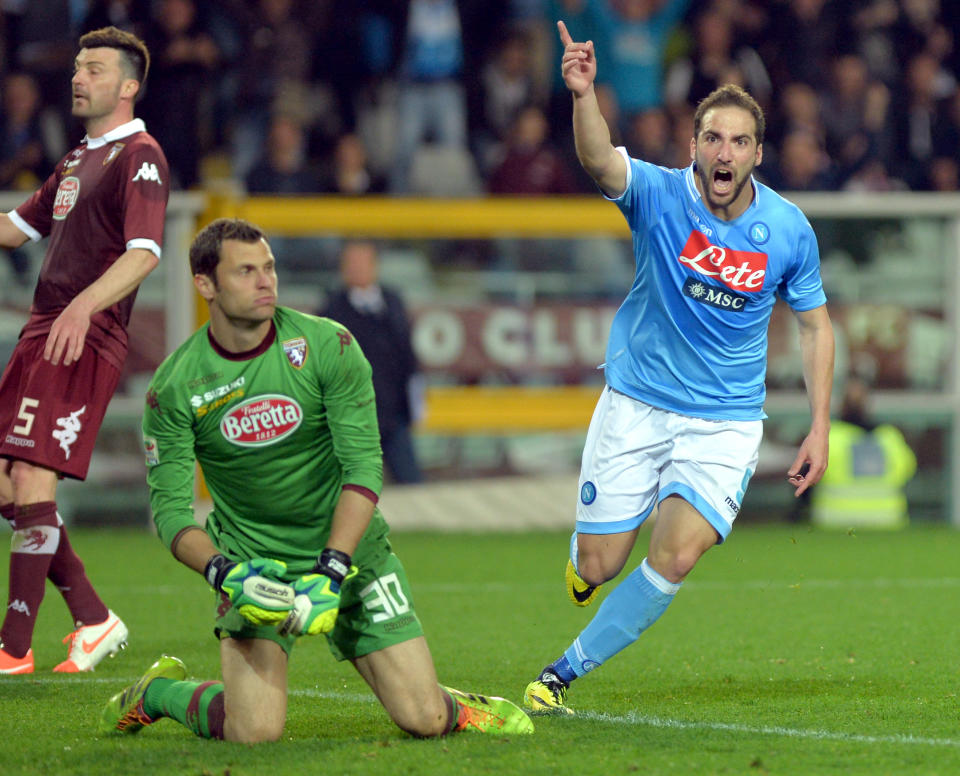 Napoli forward Gonzalo Higuain celebrates after scoring during a Serie A soccer match between Napoli and Torino, at the Olympic stadium, in Turin, Italy, Monday, March 17, 2014. (AP Photo/Massimo Pinca)