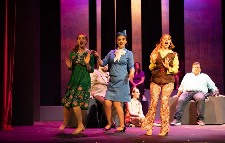 Bobby's girlfriends Kathy, April and Marta, played by Aiyanna Fivecoat, Lauren Goyer and Sydney Bramlett, sing "You Could Drive a Person Crazy" in a scene from "Company" at the Croswell Opera House.