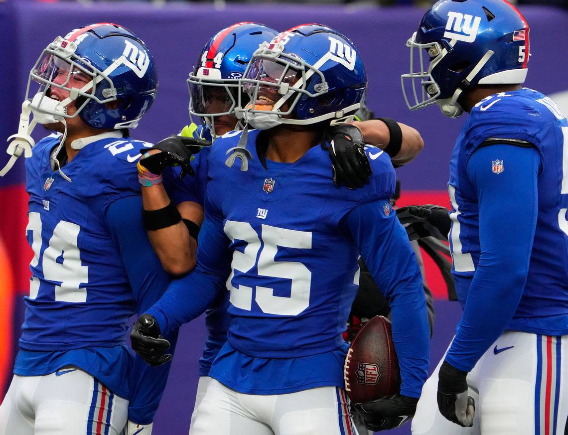 New York Giants cornerback Deonte Banks (25) celebrates an interception against New England Patriots at MetLife Stadium on Nov. 26, 2023.