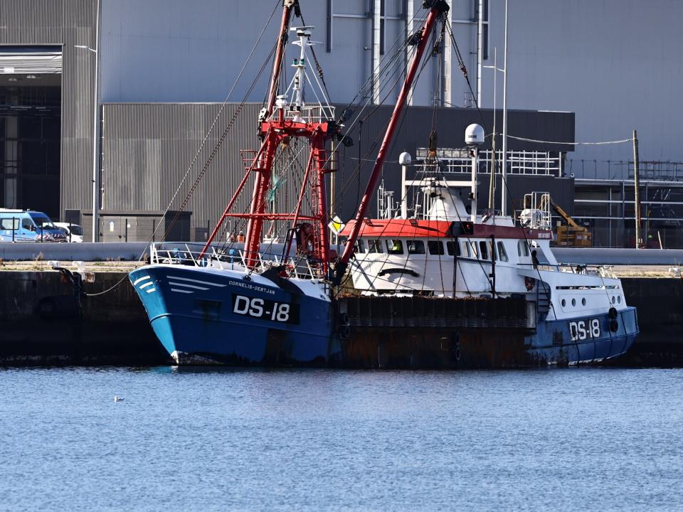 The French Gendarmerie patrol boat Athos and a British trawler Cornelis Gert Jan are seen moored in the port of Le Havre (Reuters)