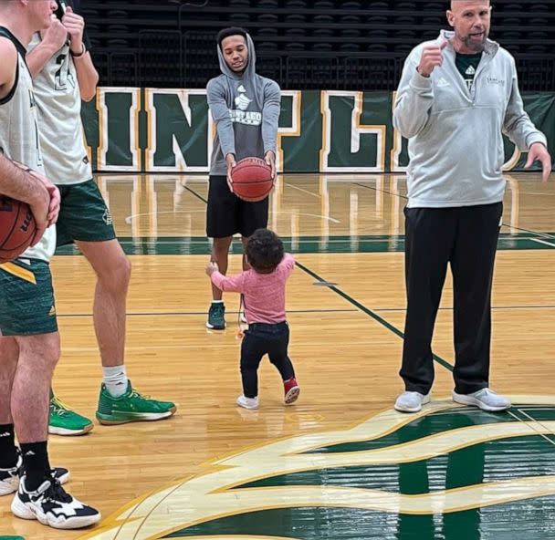 PHOTO: Aiden Webster attends practice for the Saint Leo University basketball team, for which his mom Ashley Webster is an assistant coach. (Courtesy Pam Randall)