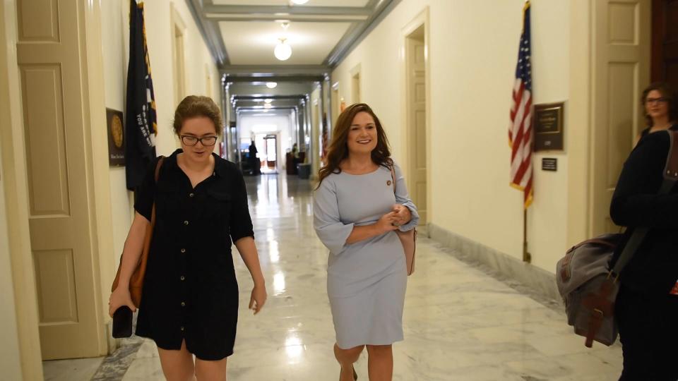 Rep. Abby Finkenauer traveling the halls of the Cannon House Office Building on Capitol Hill